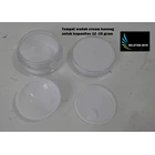 places of empty plastic cream containers 4